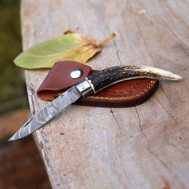 Handmade Damascus steel folding knife