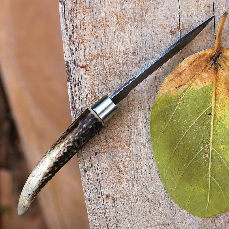 Handmade Damascus steel folding knife